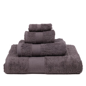 Set of gray towels stacked on a white background