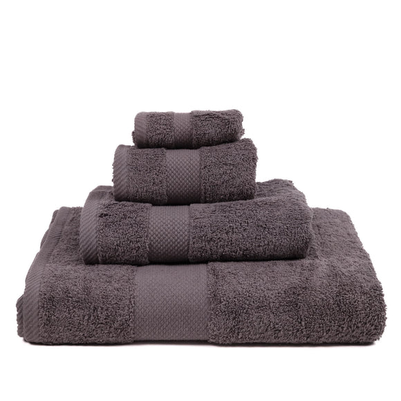Set of gray towels stacked on a white background